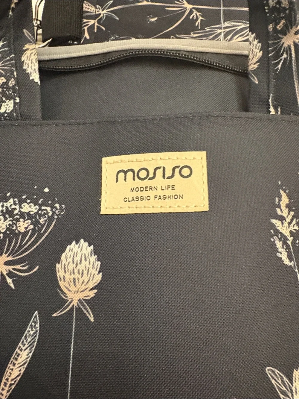 Mosiso brand Black Floral Laptop Bag with Cream Accents